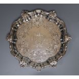 A George II silver waiter, with engraved crest and later engraved decoration, William Peaston,