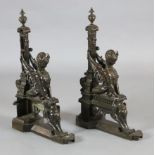 A pair of 19th century French bronze chenets, modelled with sphinx beside squared columns on stepped