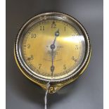 An early 20th century Smith's brass automobile timepiece, diameter 9cm