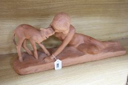 A French Art Deco terracotta figure group of a nude female and lamb, in the manner of Ugo