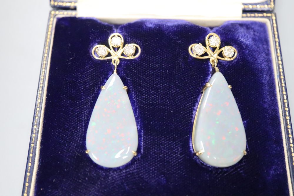 A pair of yellow metal, diamond and pear shaped black opal drop earrings, overall 47mm, gross 18 - Image 2 of 2