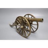 A bronze model canon, length 32cm