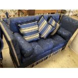 A three seater Knoll settee upholstered in dark blue damask, width 182cm, depth 78cm, height 114cm