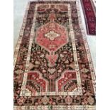 A Hamadan rug 250cm x 130cm