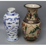 A Chinese famille rose crackle glaze vase and a Chinese blue and white dragon vase, tallest 34cm