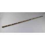 A 18th century baleen agate banded walking cane, 32in.