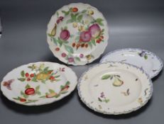 Four Chelsea fruit-painted plates c1755-60, one red anchor, two with brown anchor markCONDITION: The
