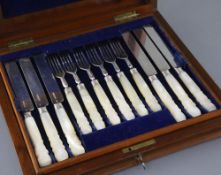 A Victorian cased set of twelve pairs of mother of pearl handled silver fruit eaters, by Francis