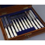 A Victorian cased set of twelve pairs of mother of pearl handled silver fruit eaters, by Francis