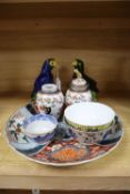 A pair of Chinese parrots, a pair of Samson vases, an Imari dish and three bowls