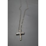 A modern 18ct white gold and diamond set cross pendant, 24mm, on an 18ct white gold chain, gross 4.4