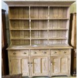 A late Victorian pine dresser, width 200cm depth 54cm height 238cm