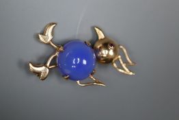 A 1960's 9ct gold and cabochon blue chalcedony? set novelty bird brooch, 34mm, gross 5.2 grams.