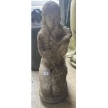 A reconstituted stone garden ornament of a kneeling girl, height 63cm