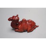 A Doulton style flambe figure of a camel, length 13cm
