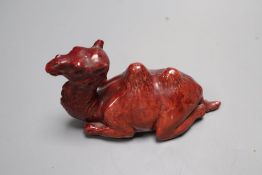 A Doulton style flambe figure of a camel, length 13cm