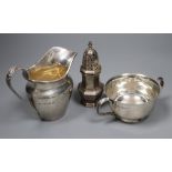 A 1930's silver cream jug, a silver sugar bowl and a silver caster, 9oz.