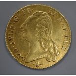 A Louis XVI two Louis d'Or coin, 1787D, VF.