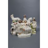 Five Staffordshire pottery groups, late 19th century, tallest 31cm