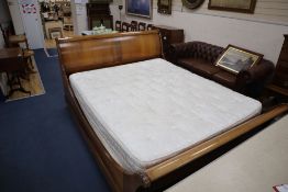 A French Empire style mahogany sleigh bed frame with 'So to bed' Thornton mattress, width 5ft. 6in.