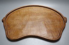 A Mouseman oak tray, carved with two mice, 47cm wide