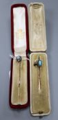 A Victorian yellow metal, star sapphire and diamond cluster set stick pin, 62mm and two other