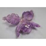 A modern white metal and diamond mounted carved amethyst flower head brooch, width 62mm.
