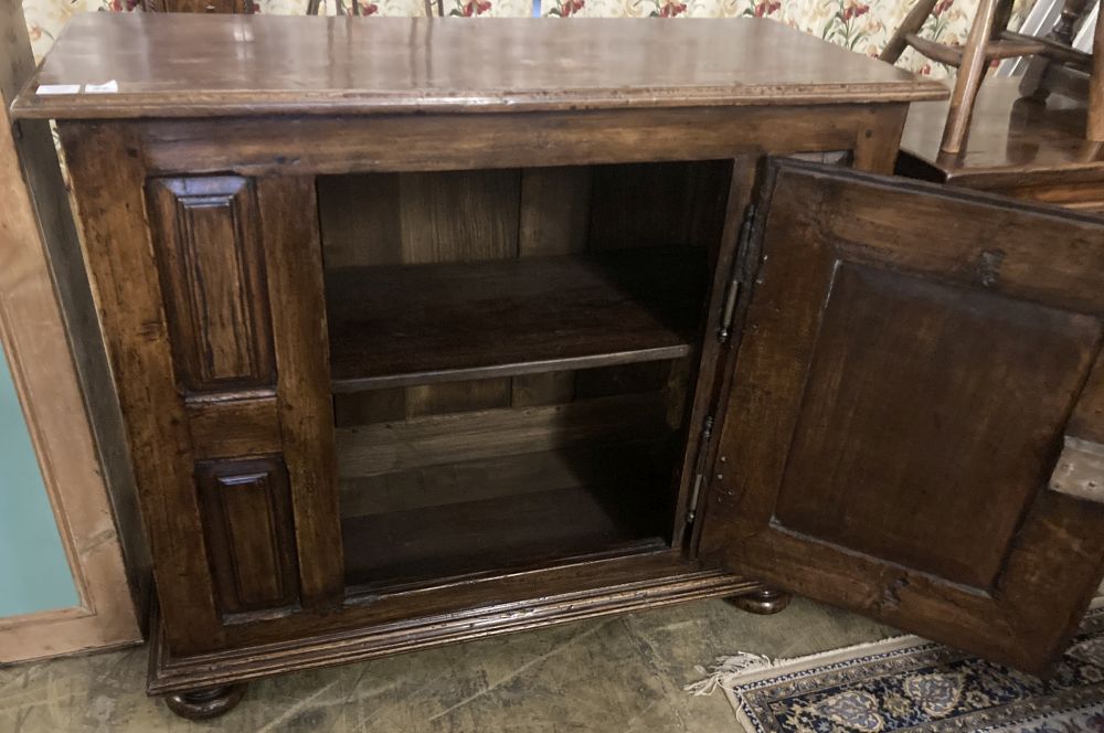 A mid 18th century French provincial walnut cupboard, enclosed by a single door, width 117cm, - Image 6 of 7