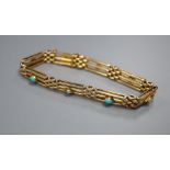 A 15ct gold long gate-link bracelet set with turquoise cabochons and seed pearls, gross 12.7g.