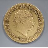 A George III gold sovereign, 1820, VF.