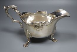 A George V silver sauceboat, London, 1911, height 12.4cm, 13oz.CONDITION: The top of the handle