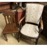 A late Victorian mahogany framed armchair, with floral striped upholstered seat and back and a