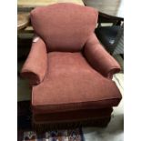 A modern red upholstered armchair, width 88cm, depth 100cm, height 80cm