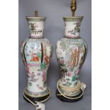 A pair of Chinese-style famille rose table lamps and shades, total height to fitting 57.5cm, one