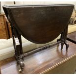 A mid Victorian oak Sutherland table, width 90cm height 74cm