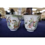 A pair of Chinese famille rose cups, Tongzhi marks and of the period (1862-74), height 7.5cm