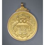 A 1930's 9ct gold 'Staffordshire Football Association' pendant medal, presented to S.Lawson for long