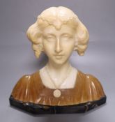 An Art Nouveau alabaster portrait bust, 'Laura', on black marble plinth, 26cm