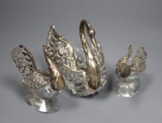 Three assorted metal and glass bon bon dishes, including swan stamped 'silver' and cockerel, tallest