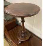 A Victorian mahogany circular topped wine table, 54cm diameter, height 59cm