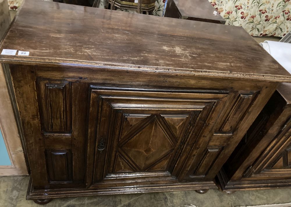 A mid 18th century French provincial walnut cupboard, enclosed by a single door, width 117cm,