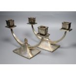 A pair of Chinese Export white metal two branch, two light candelabra, By Wai Kee, Hong Kong, with