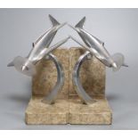 A pair of Art Deco style aluminium low-wing monoplane bookends, 19cm high