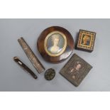 A circular tortoiseshell box, cover inset with portrait miniature, a miniature white metal icon