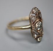 A 1920's? Austrian pierced 585 yellow metal and diamond set oblong dress ring, size M, gross 2.8