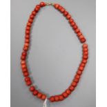 A single strand coral bead necklace, with GCS report indicating colour modification, 47cm, gross