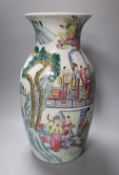 A Chinese porcelain baluster vase, painted with figures in famille rose enamels, height 39cm