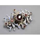 An early 20th century Austro-Hungarian? white metal, garnet and enamel set brooch, 43mm, gross 13.