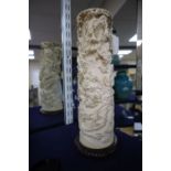 An early 20th century Japanese ivory tusk carving, unsigned, on wood plinth