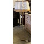 A brass standard lamp with French Horn light holders, height 174cm